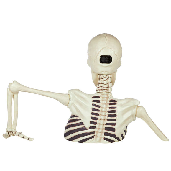 Motion Sensor Activated Giant Ground Breaking Skeleton, 111”  (L) × 55” (W) × 62”  (H)