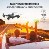 UKING Foldable Drone with 1080p HD Camera, Quadcopter with Wide Angle 480P FPV Live Video with Gesture Control/Follow me Mode/Altitude Hold for Last 18 mins